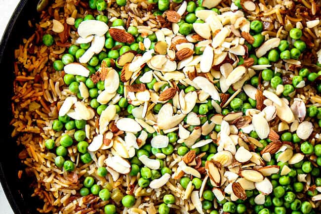 showing how to make rice pilaf by adding slivered almonds