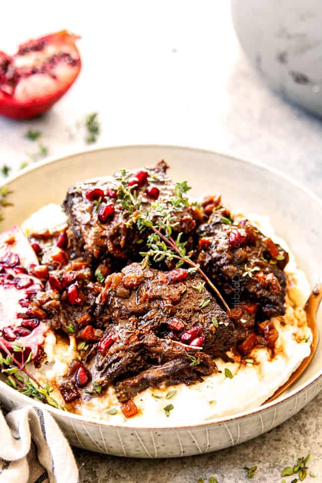 side view of a bowl of juicy short ribs