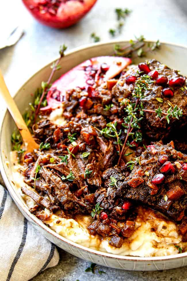 a fork shredding tender short ribs