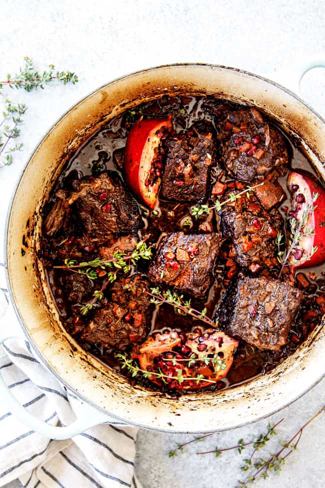 top view showing how to make short ribs recipe by simmering braising liquid