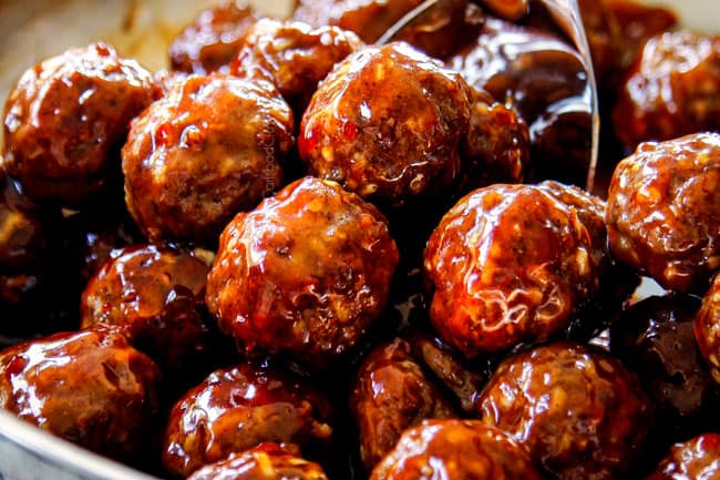 showing how to make cocktail meatballs by simmering meatballs with sauce