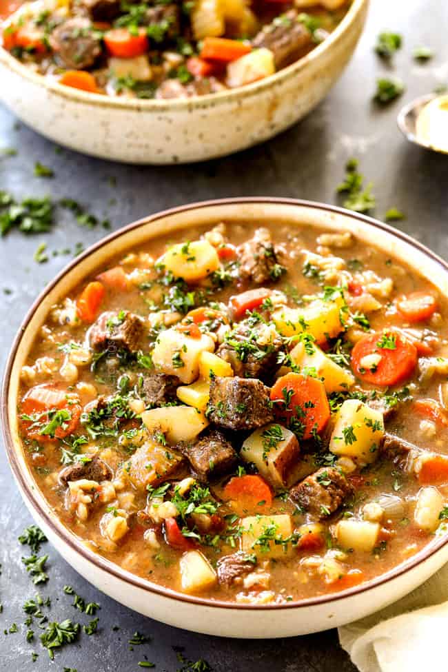 showing how to make slow cooker beef barley soup recipe by cooking in slow cooker until beef is tender
