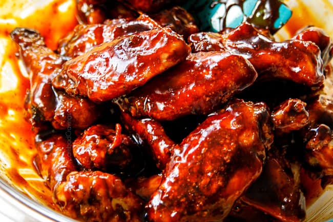 showing how to make Korean Chicken Wings by coating with Korean BBQ Sauce with gochujang