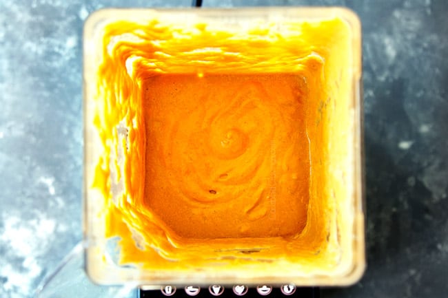 showing how to make lobster bisque by blending lobster stock in blender