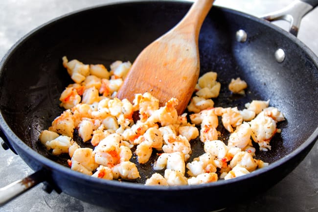 showing how to make lobster bisque by sauteeing lobster in butter