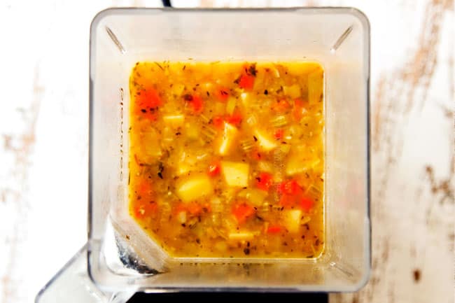 showing how to make potato leek soup by adding soup to the blender to puree