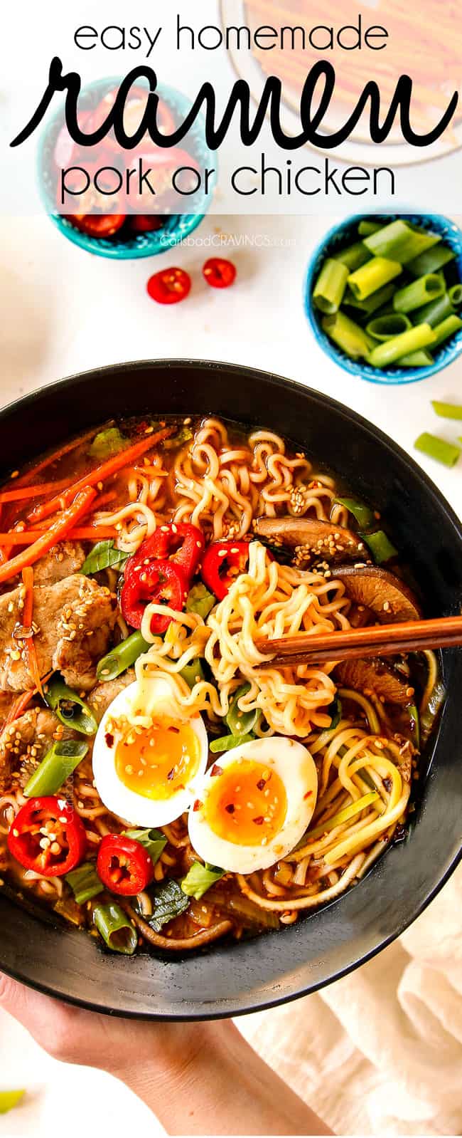 top view of showing how to eat ramen by picking up ramen noodles with chopsticks