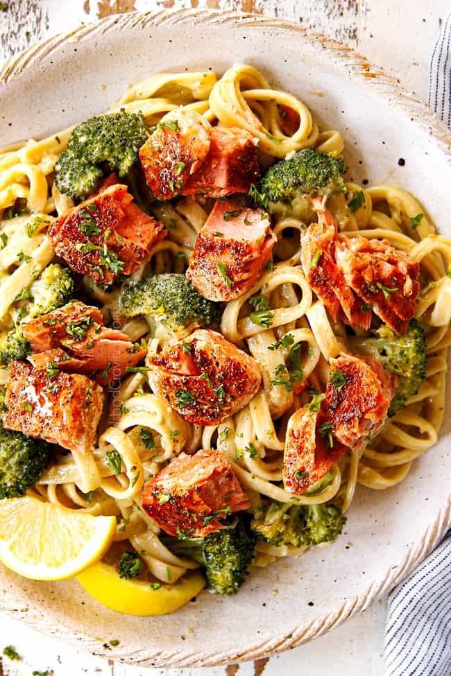 up close view of creamy salmon pasta recipe showing how juicy the salmon is