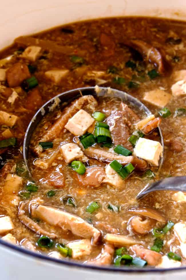 up close of Hot and Sour Soup recipe scooping up soup