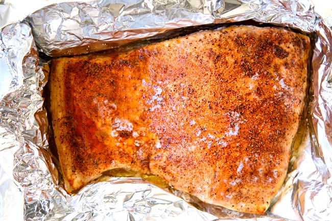 showing how to make salmon pasta by baking salmon until cooked through