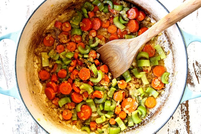 showing how to make homemade chicken and dumplings recipe by sauteing onions, carrots and celery