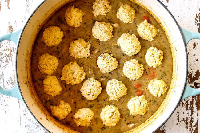 showing how to make homemade chicken and dumplings recipe by adding drop dumplings to the soup