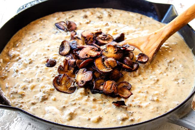 showing how to make ground beef stroganoff by adding mushrooms back to sauce