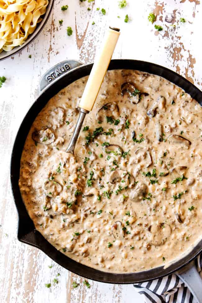 top shot of mushroom gravy in a skillet showing how creamy best ground beef stroganoff recipe is