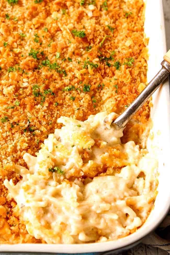 scooping how creamy and cheesy hashbrown casserole
