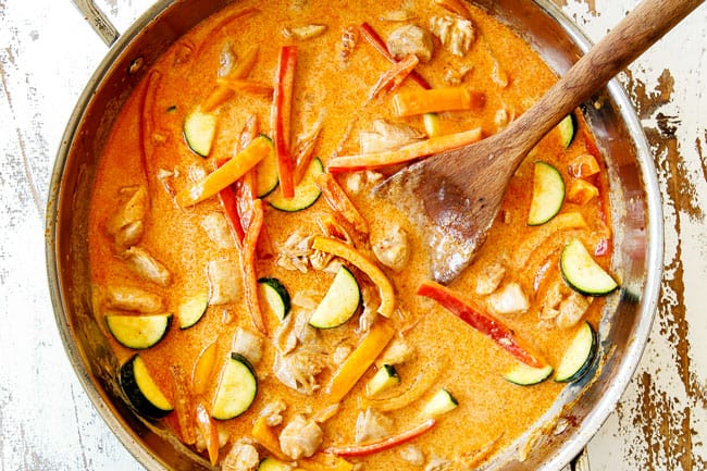 showing how to make rice noodles by adding coconut milk to a stainless steel saucpan