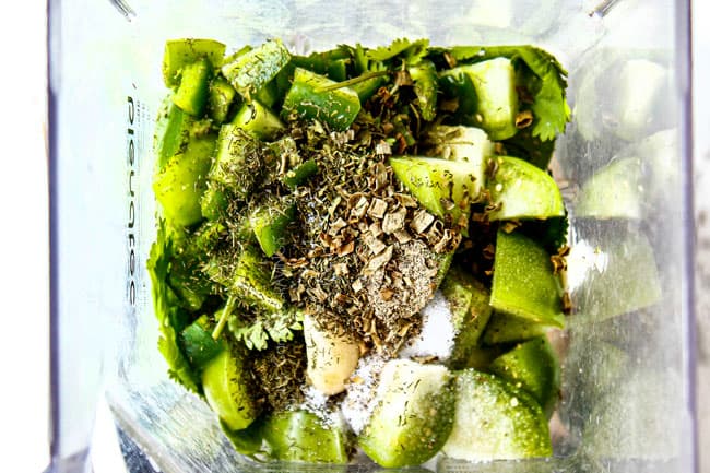 showing how to make Mexican Salad recipe by adding mayonnaise, sour cream, cilantro, tomatillos, jalapenos, garlic to blender