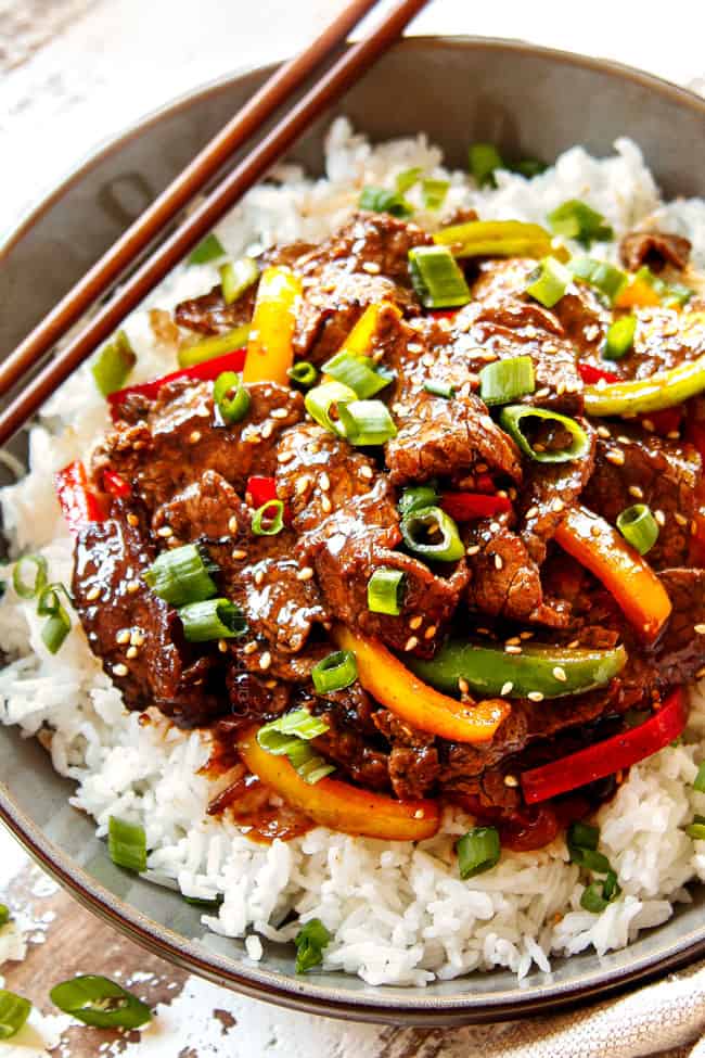 pepper steak in a bowls served with rice
