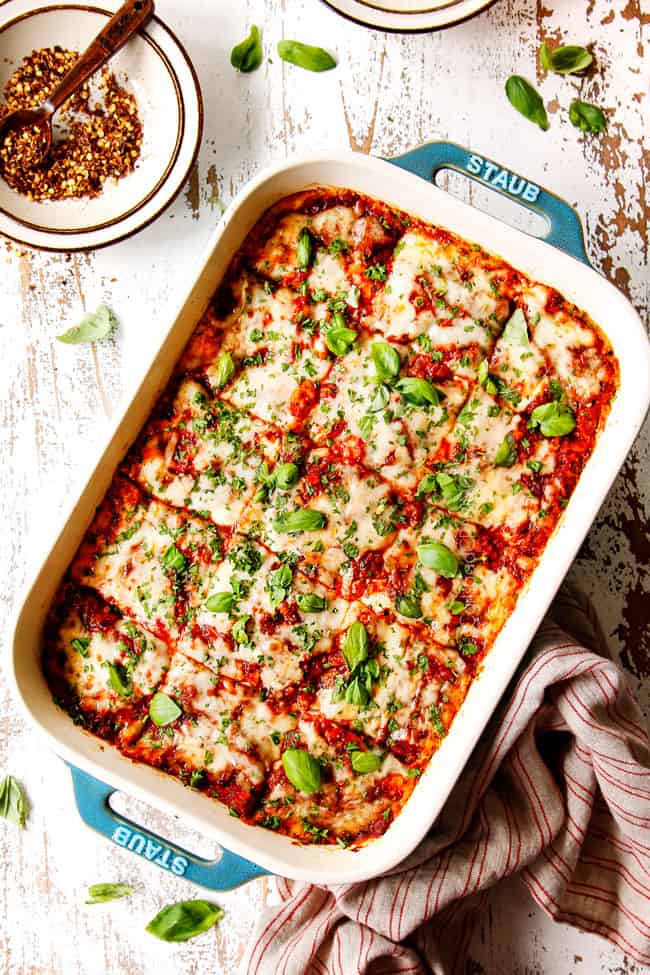 top view of zucchini lasagna cut into slices and garnished with basil