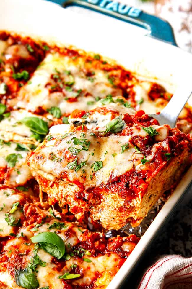up close of a slice of zucchini lasagna recipe in a baking dish