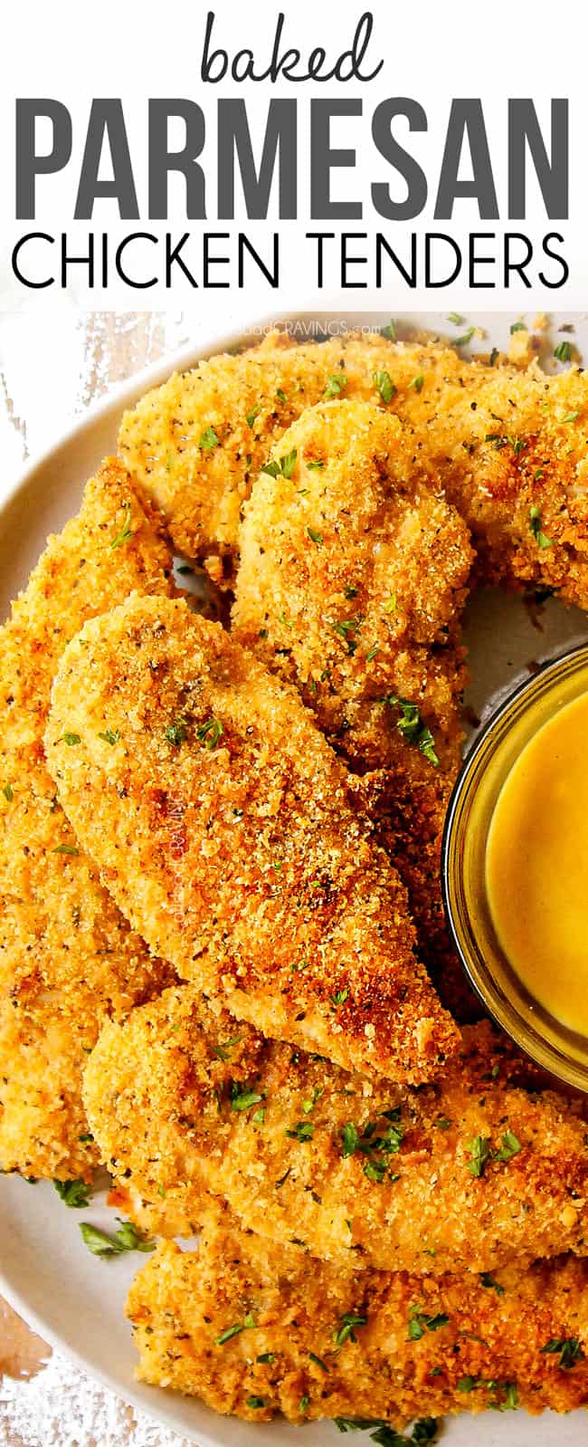top view of Parmesan crusted chicken stacked on a white plate