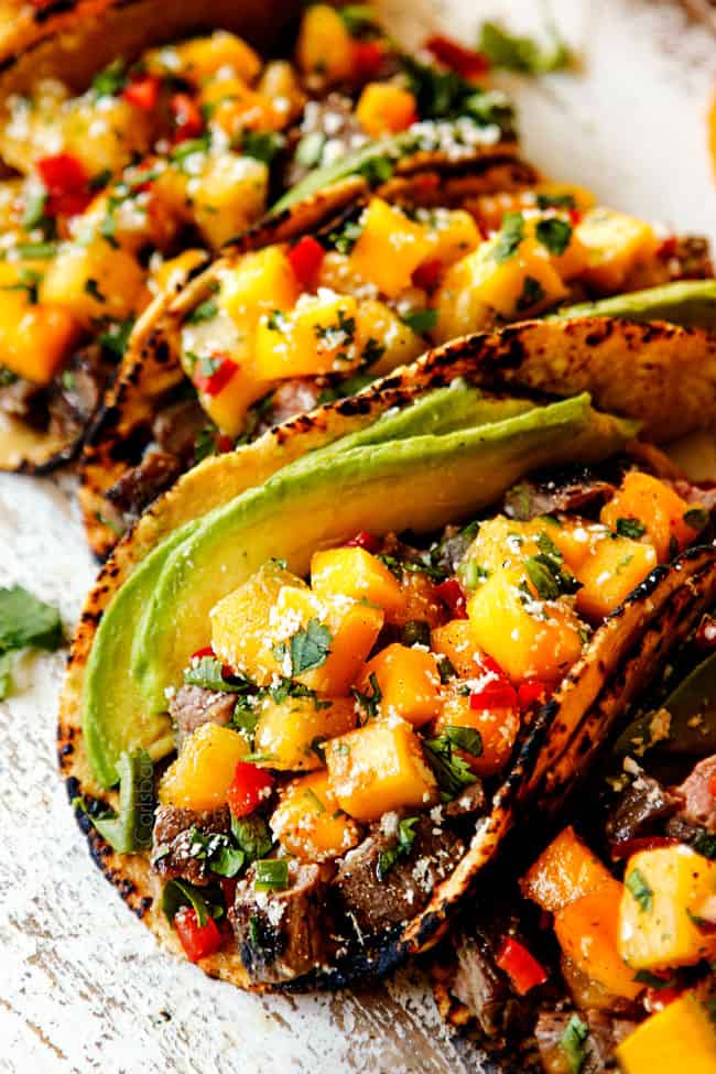 up close of flank steak taco recipe with chopped flank steak and pineapple salsa