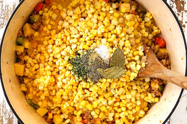 top view showing how to make corn chowder by adding corn, creamed corn, chicken broth, parsley, thyme and oregano