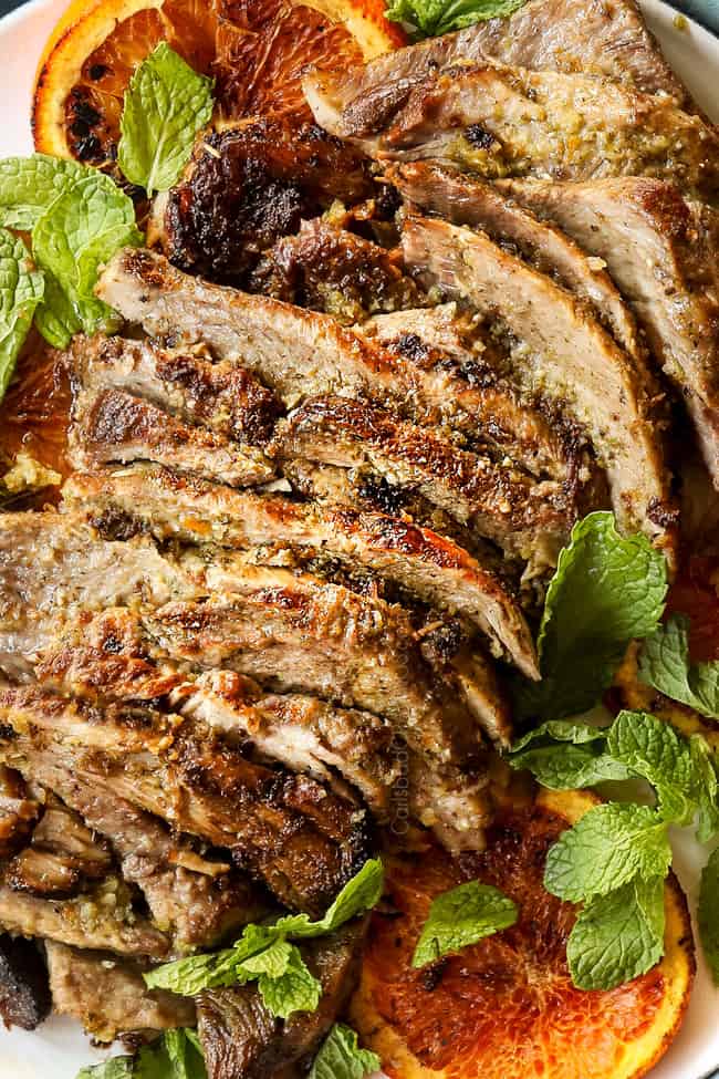 showing how to make Cuban sandwiches (Cubanos) by lining Cuban mojo pork on a plate