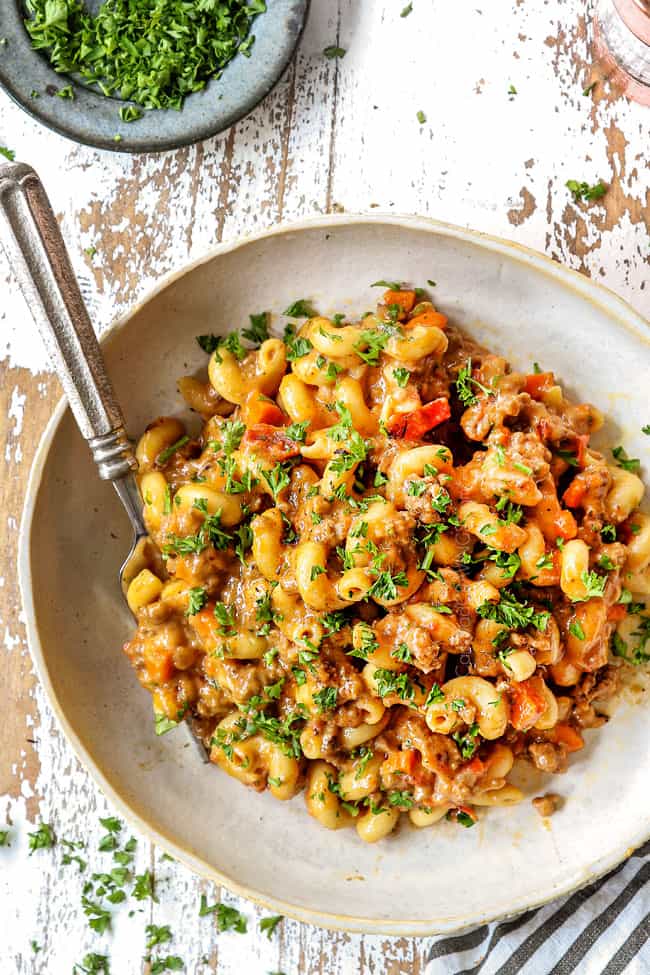 top view of a bowl of homemade hamburger helper with a silver fork