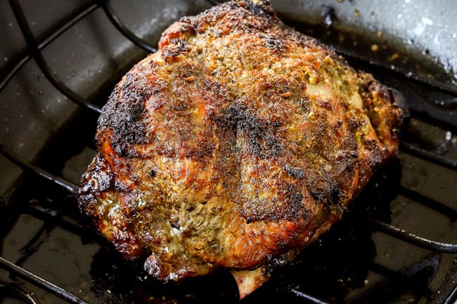 showing how to make mojo Cuban roast pork (lechon asado) by roasting on a backing rack