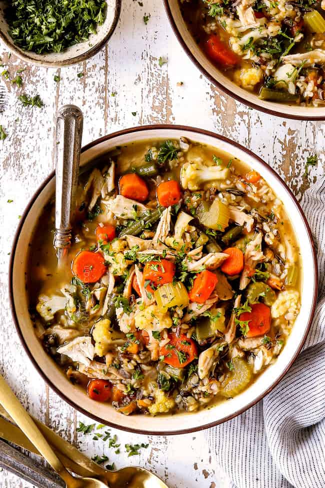 top view of a bowl of turkey soup with rice