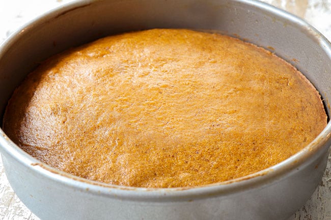 showing how to make pumpkin spice cake recipe by cooling cakes on a wire rack