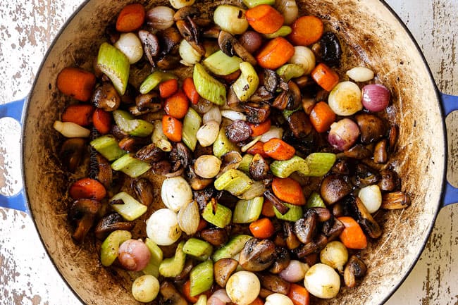showing how to make chicken fricassee recipe by sautéing carrots, celery, onions and mushrooms until tender