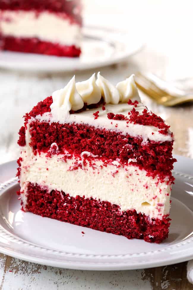 a slice of red velvet cheesecake recipe on a white plate