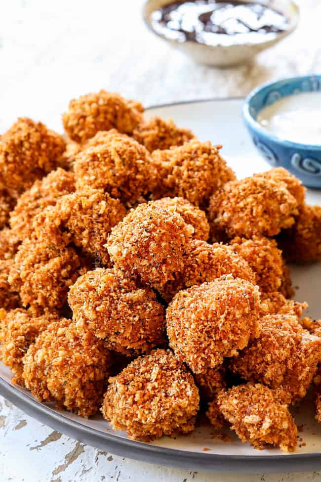 showing how to serve chicken nugget recipe with ranch and bbq sauce