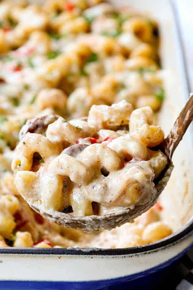up close of a scoop of Cajun Chicken Alfredo showing how creamy it is