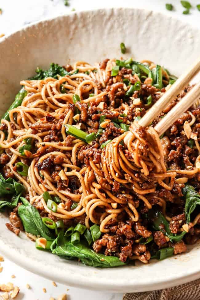 twirling Dan Dan Noodles on chopsticks