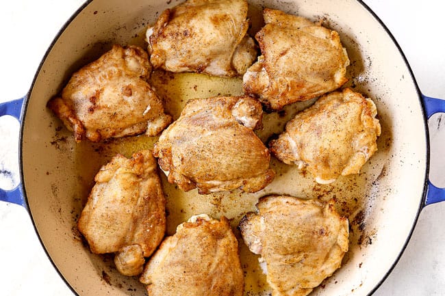 showing how to make chicken cacciatore recipe by searing chicken in a pan