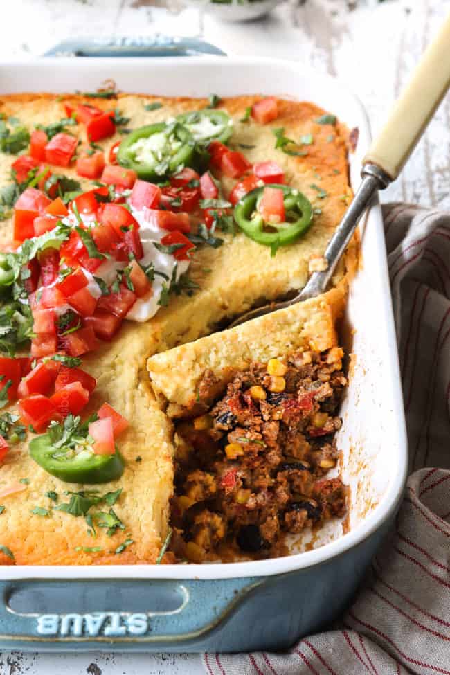 up close of a spoonful of tamale pie with corn, tomatoes and black beans