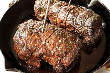 showing how to cook beef tenderloin by inserting meat probes into the beef so it cooks evenly