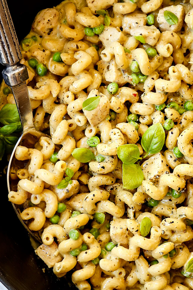 up close of chicken pesto pasta showing how cream it is