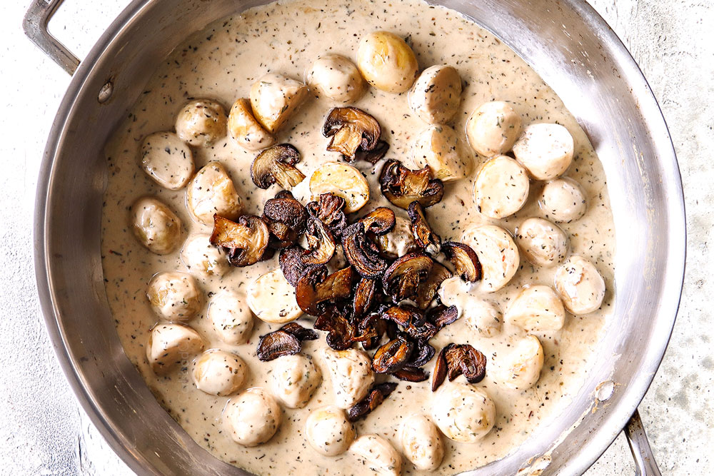 showing how to make Chicken mushroom recipe by adding mushrooms to sauce