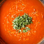 showing how to make fideo by adding cilantro and lime juice