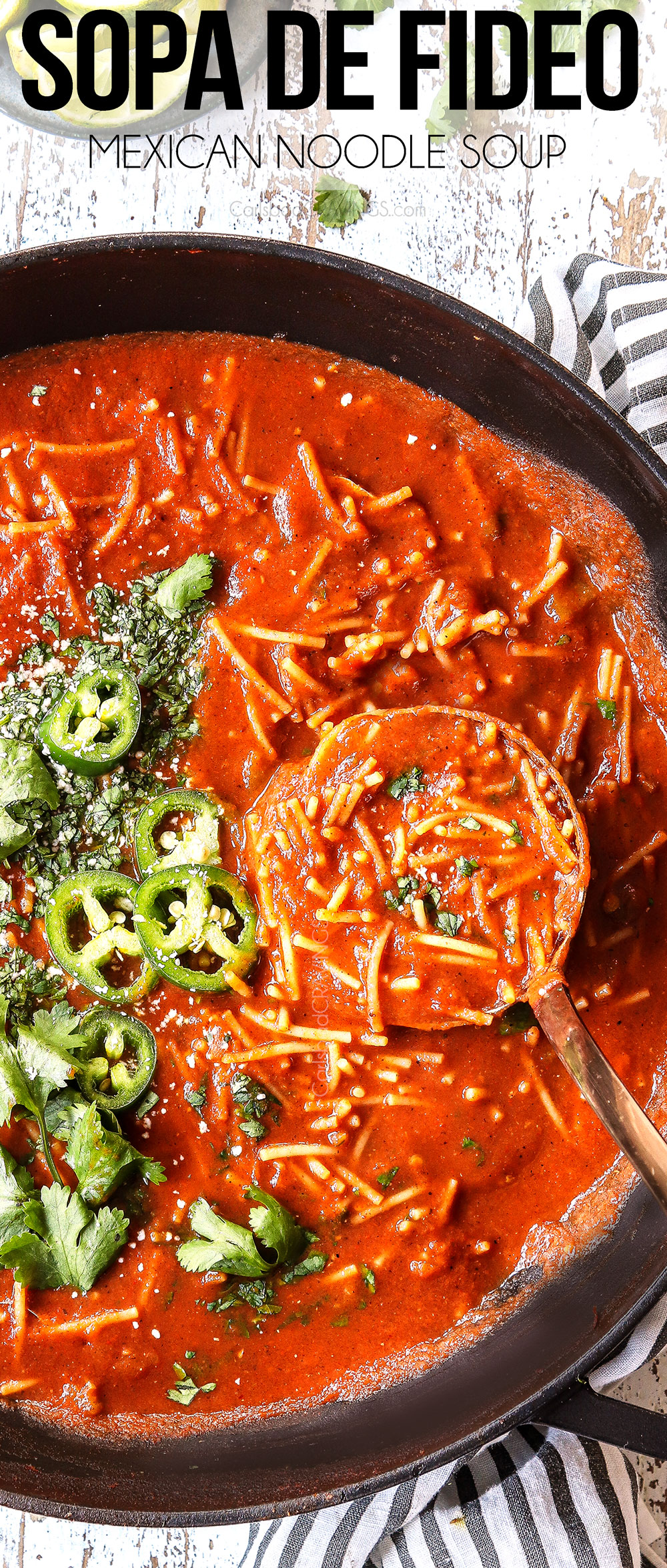 top view of sopa de fideo with a ladle
