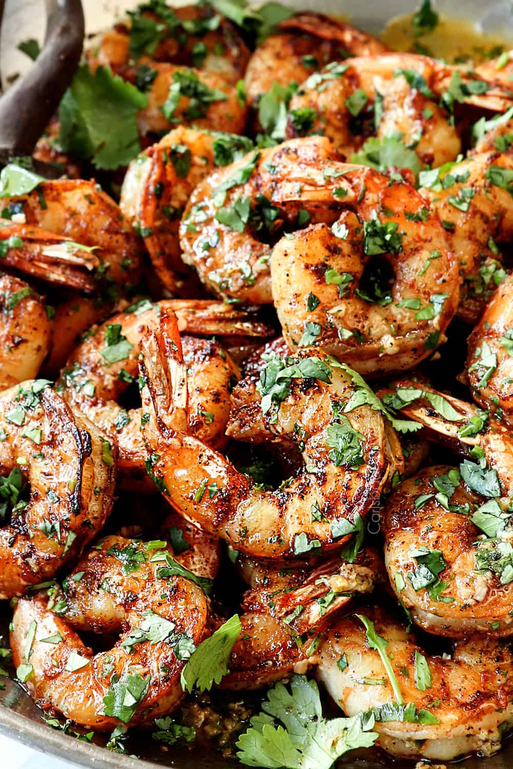 up close of cilantro lime shrimp showing how juicy they are