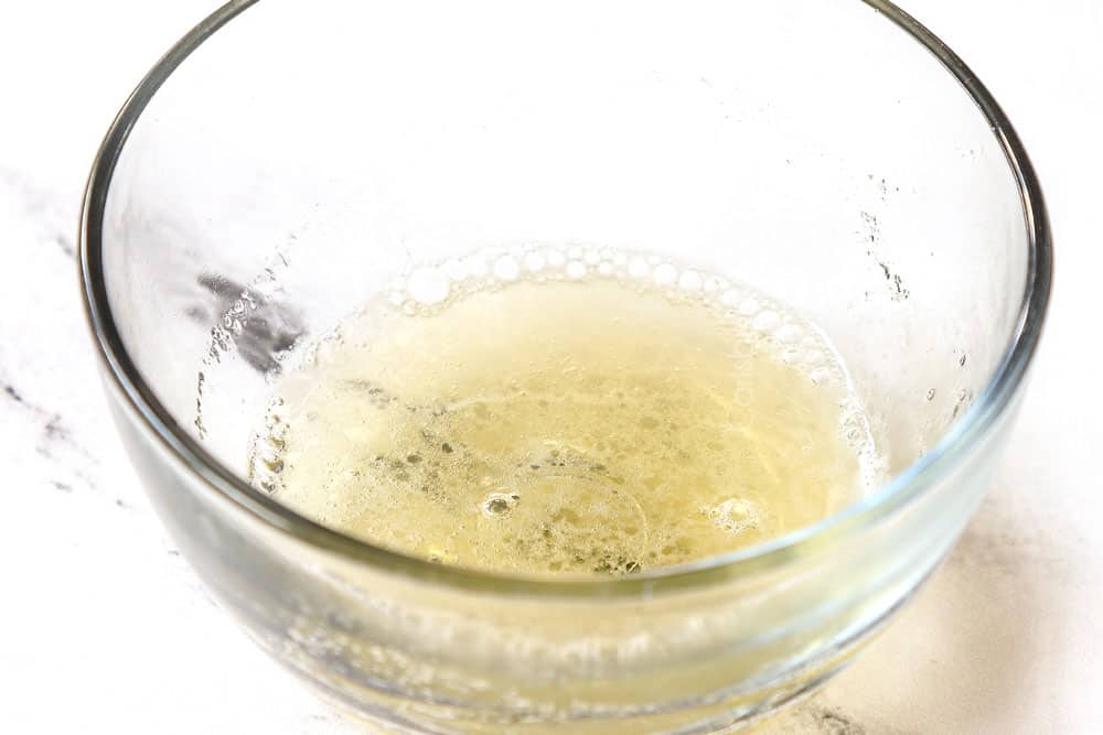 a collage showing how to make key lime cheesecake recipe by combining water and gelatin in a bowl to make stabilized whipped cream