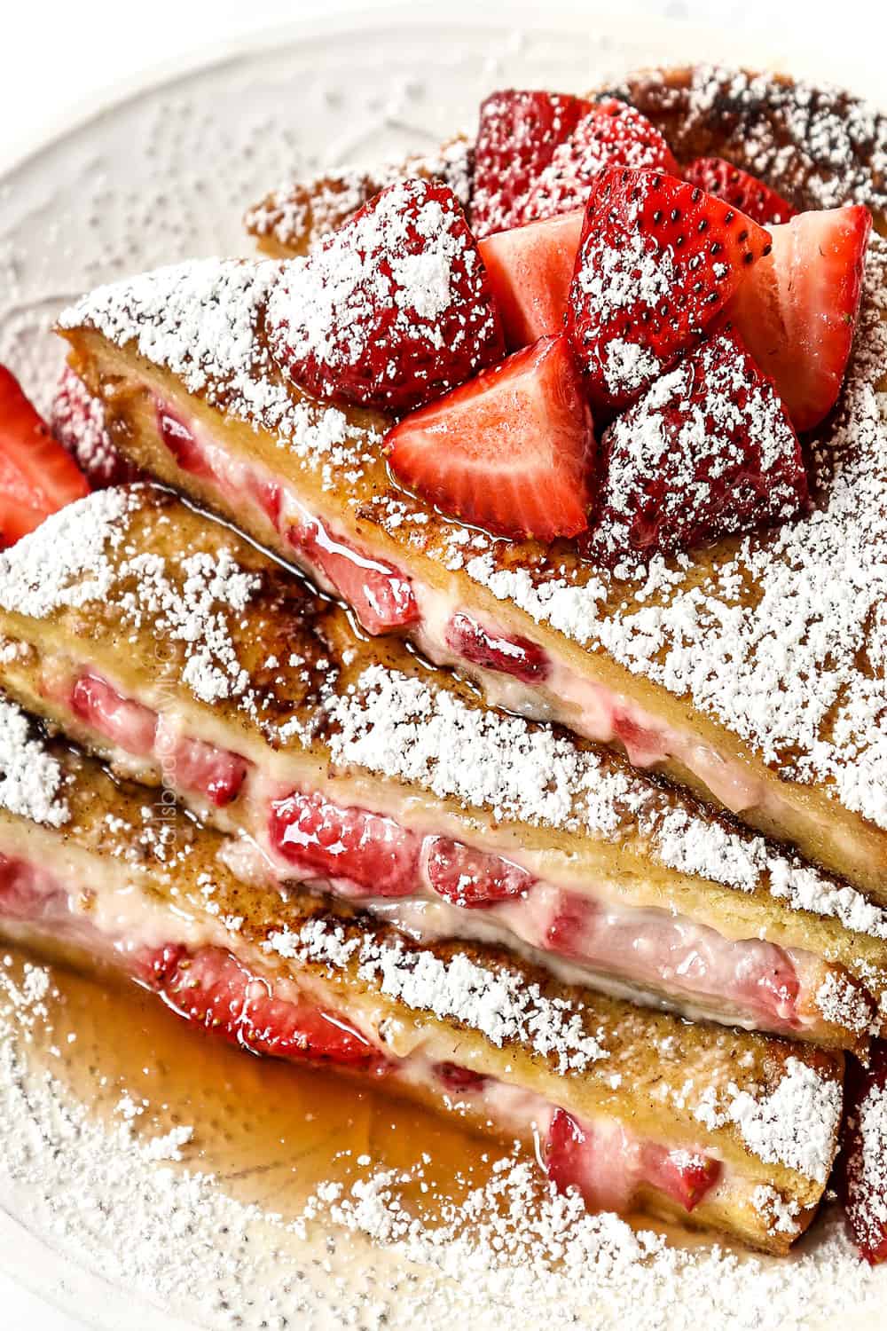 up close of stuffed French toast recipe with cream cheese and strawberries