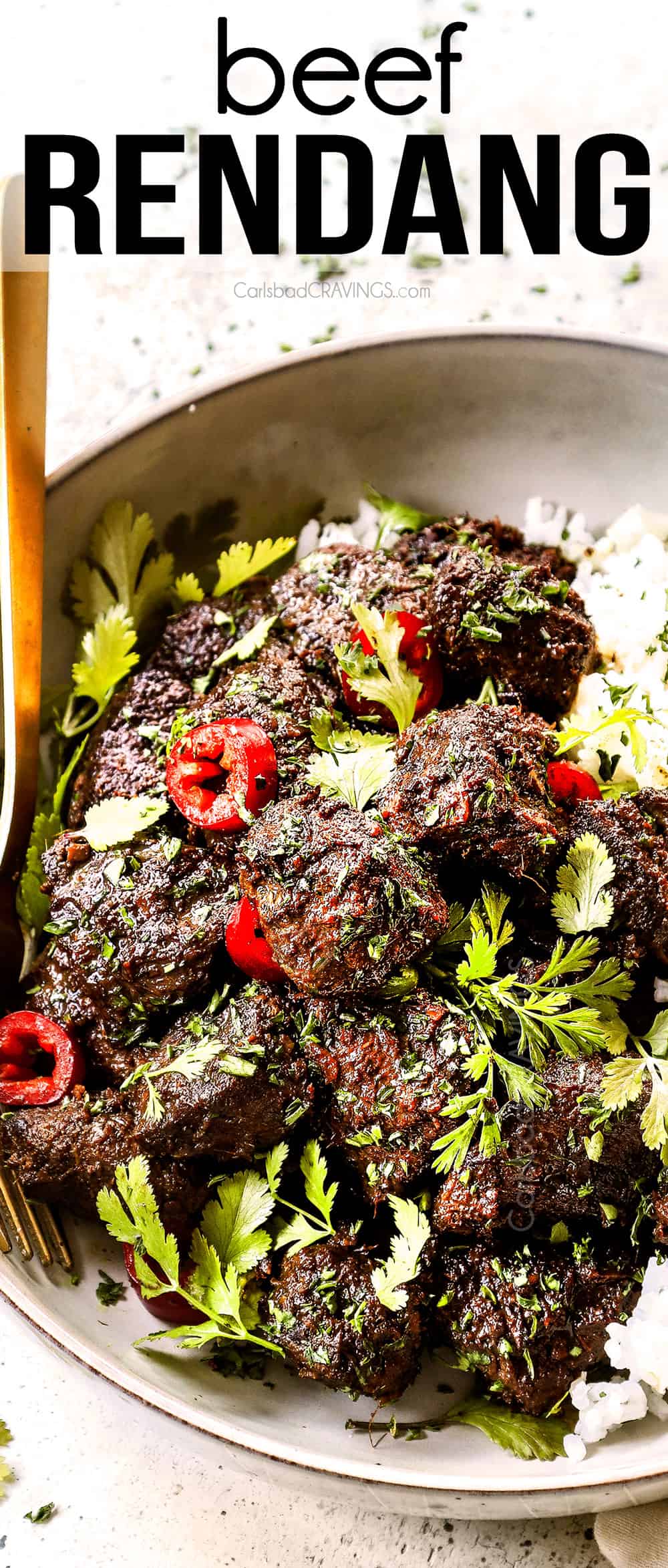 showing how to serve beef rendang by adding to a bowl with rice