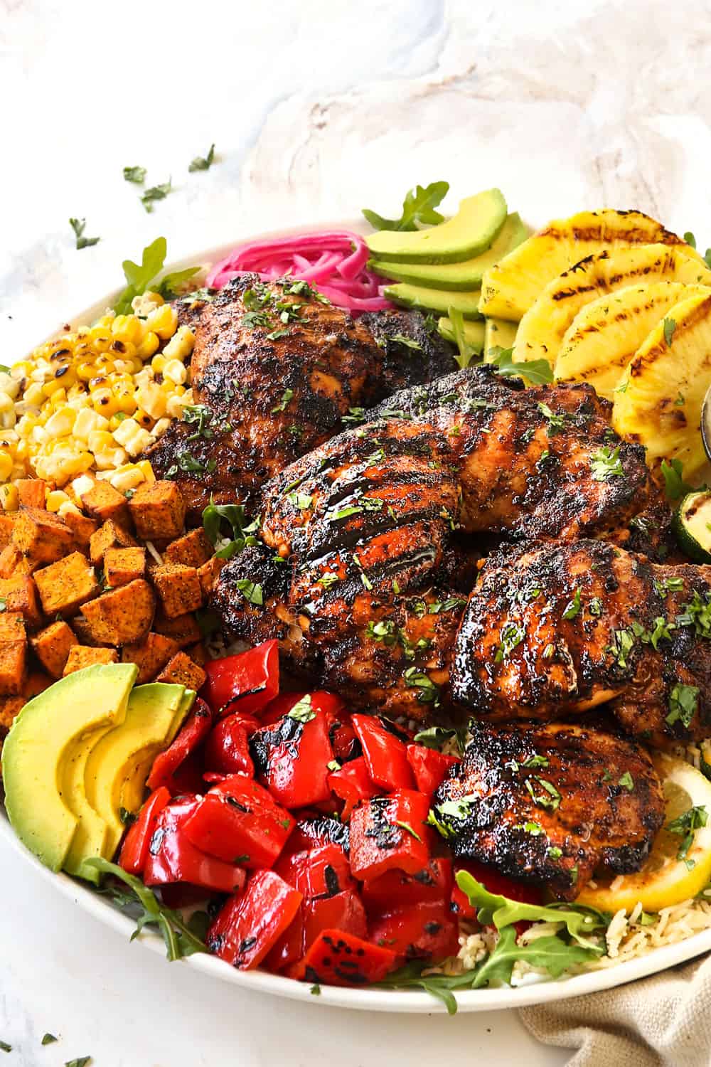 showing how to serve harissa chicken recipe on a platter