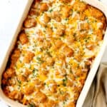 top view of tater tot casserole in a 9x13 baking dish